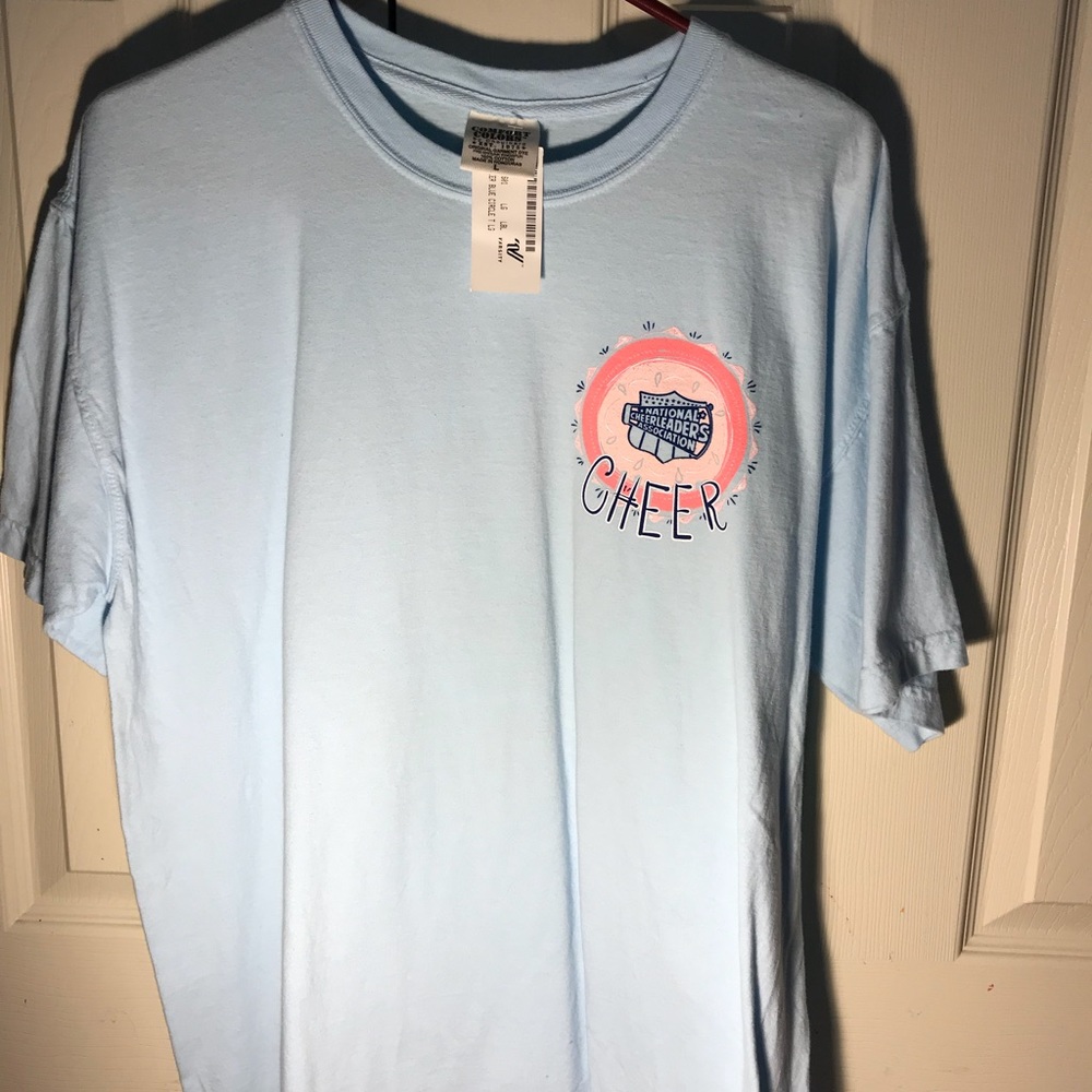 NCA/ Varsity Cheerleading Shirt size large
